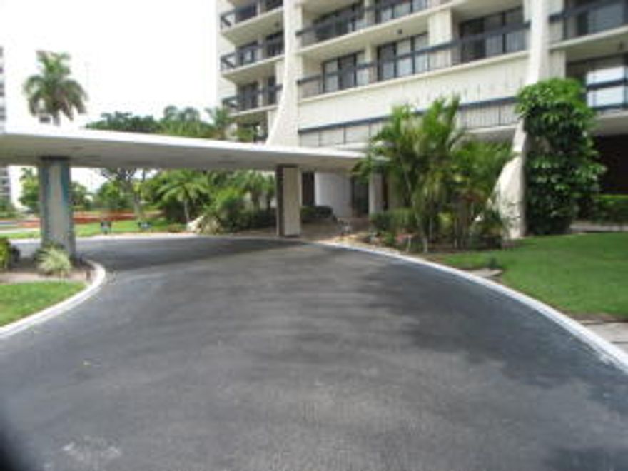 Available December 1, 2015. Really nice renovated 2 bedroom 2 bath extra large condo in luxury building with doorman and lots of amenities. Beautiful white kitchen, gorgeous bathrooms with granite counters. White tile flooring in living area. Pretty view. One covered carport space assigned #74. Extra open parking available. Great location in north end of WPB near new Outlet Mall, Target, I95, beaches, restaurants, shopping & libraries. Rent includes cable, water & pest control.
