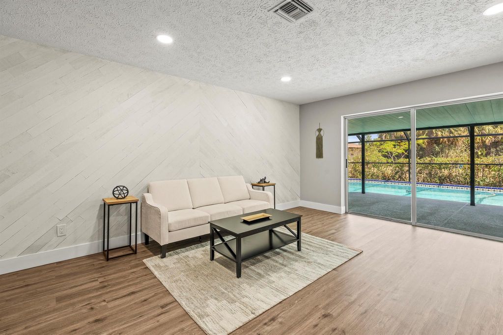 Photo of 361 NE Genesee Avenue, Port Saint Lucie, FL 34983 (MLS # R11087147)