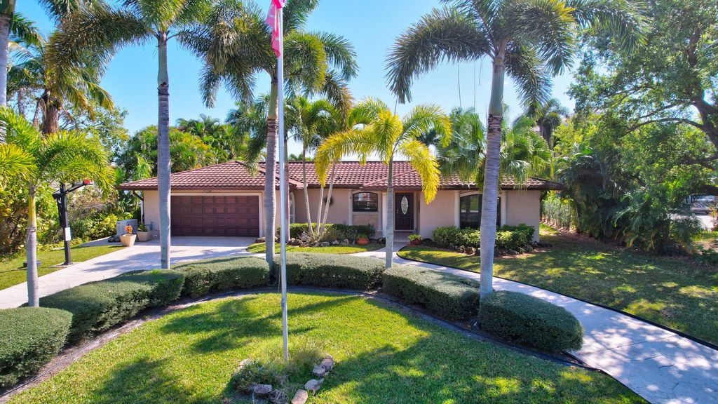 Photo of 1918 SW Mooring Drive, Palm City, FL 34990 (MLS # R10963579)