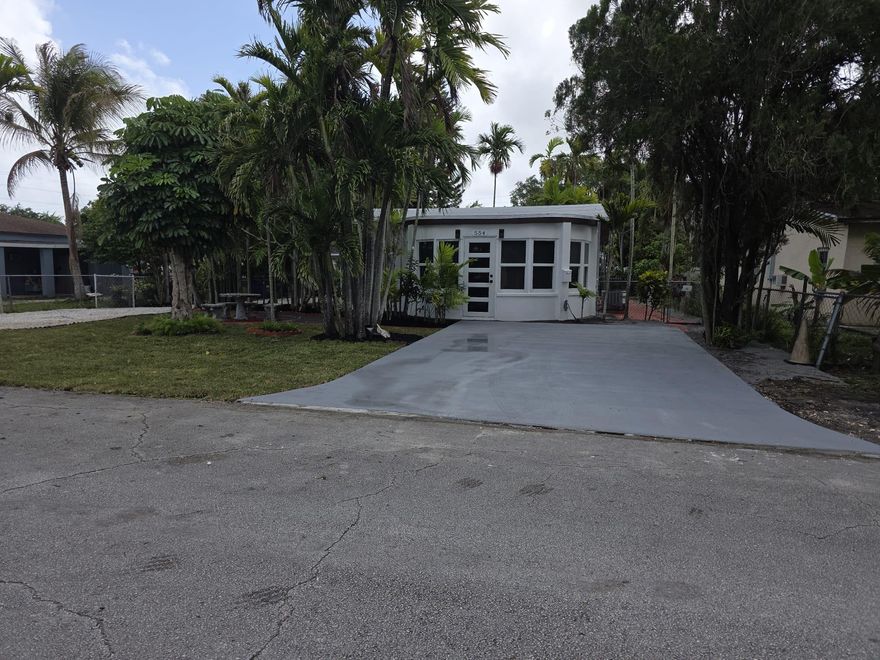 Prime Location - Steps from Miami Shores Rare opportunity to own a fully remodeled multi-structure property just blocks from Miami Shores. Situated on a lush 6,812 sq ft lot, this offering includes a 3BR/2BA main home (approx. 1,139 sq ft) plus a detached 1BR/1BA guest house (approx. 297 sq ft), totaling of 1,436 sq ft. Both homes feature new roof, updated electrical and plumbing, impact windows/doors, new kitchens, bathrooms, and Italian tile throughout. Solid concrete construction adds durability and value. Ideal for multigenerational living or rental income.  Enjoy close proximity to Miami Shores, known for its tree-lined streets, historic charm, top-rated schools, parks, golf course, and vibrant local dining scene Minutes from Downtown, Design District, Midtown, and Miami Beach.
