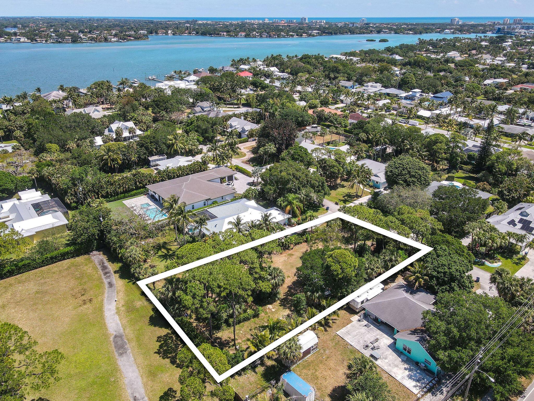 Discover the perfect canvas for your dream residence in the heart of Jupiter. This vacant lot, just under half an acre in size, awaits your vision of coastal living. Jupiter is known for its pristine beaches, championship golf courses, and upscale amenities, this property offers an unparalleled opportunity to craft your ideal lifestyle. With convenient access to schools, shopping, and entertainment, every convenience is at your fingertips.Don't miss this chance to build your dream home in one of South Florida's most sought-after destinations. Create your oasis in paradise today! Do not walk property without an appointment