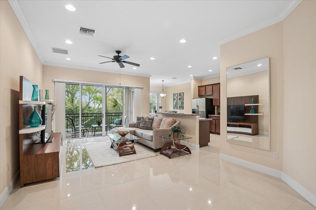 Photo of 12767 NW 83rd Court #24-e, Parkland, FL 33076 (MLS # B26006471)