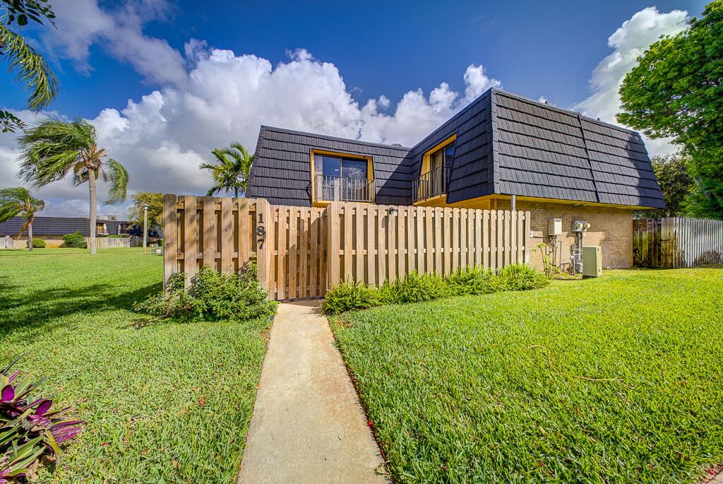 Photo of 187 Woodland Road, Palm Springs, FL 33461 (MLS # B26005907)