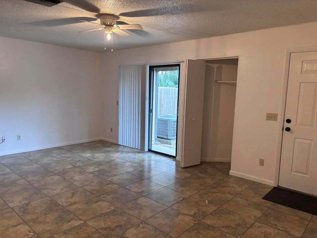 Photo of 1466 39TH Avenue #F-1, Vero Beach, FL 32960 (MLS # B26075872)