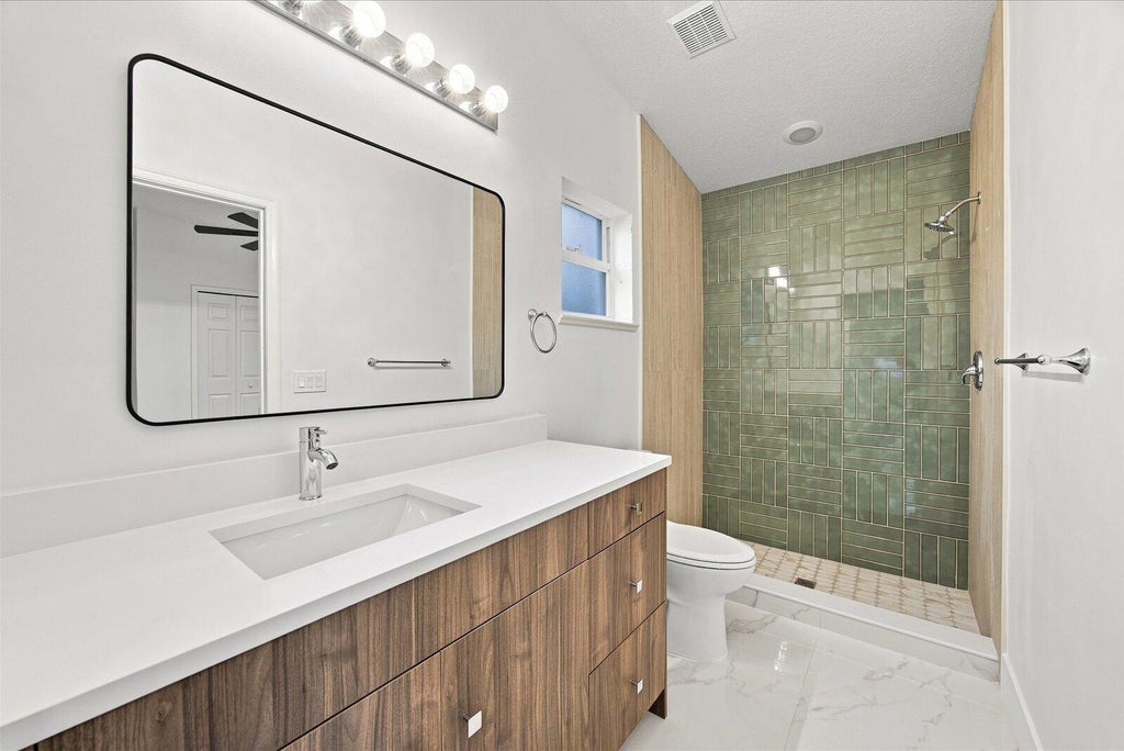 Photo of 3641 SW San Benito Street, Port Saint Lucie, FL 34953 (MLS # B26073331)