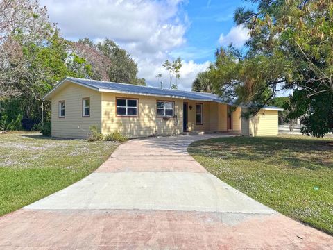 Photo of 401 SE Tranquilla Avenue, Port Saint Lucie, FL 34983 (MLS # R11145121)