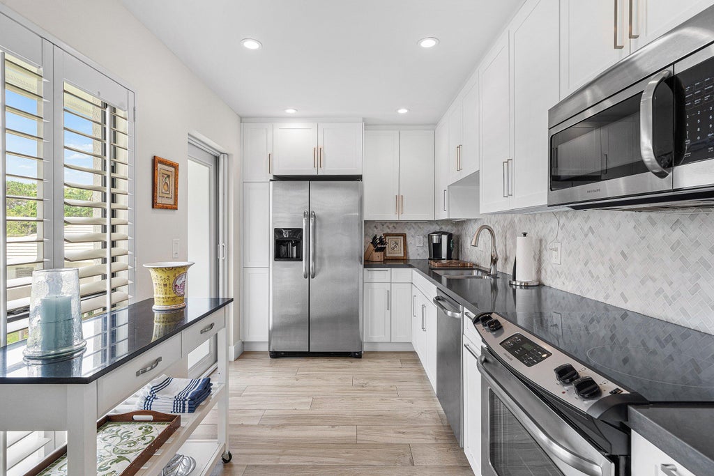 Photo of 4285 Quail Ridge Drive N #Sandpiper, Boynton Beach, FL 33436 (MLS # B26046575)