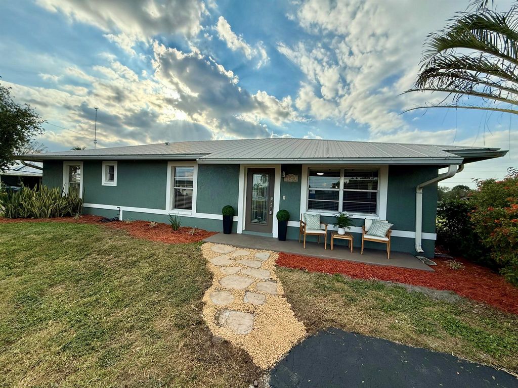 Photo of 1240 Stillwell Road, Belle Glade, FL 33430 (MLS # R11142065)