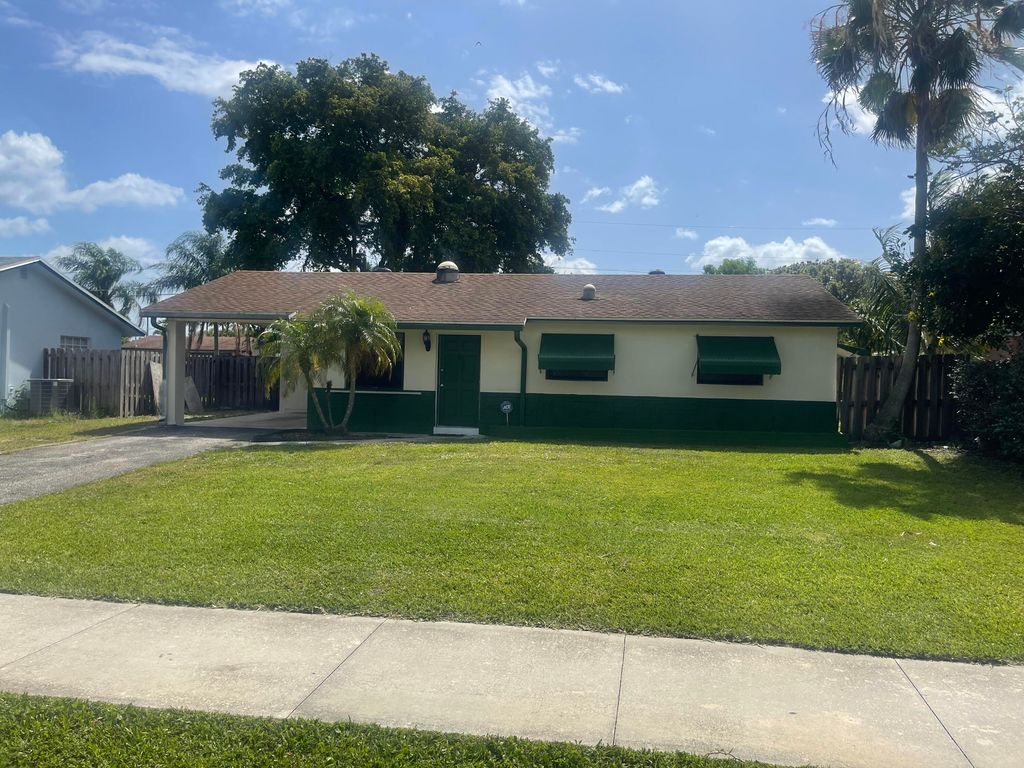 Photo of 305 E Whitney Drive, Jupiter, FL 33458 (MLS # R10792833)