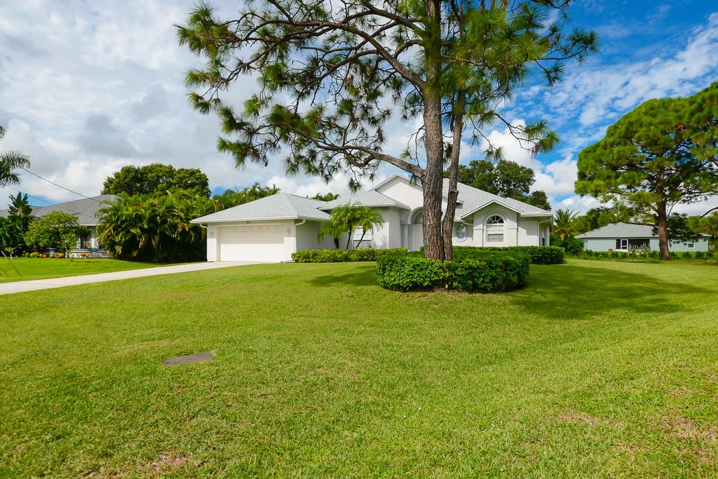 Photo of 311 SE Fisk Road, Port Saint Lucie, FL 34984 (MLS # R11123544)