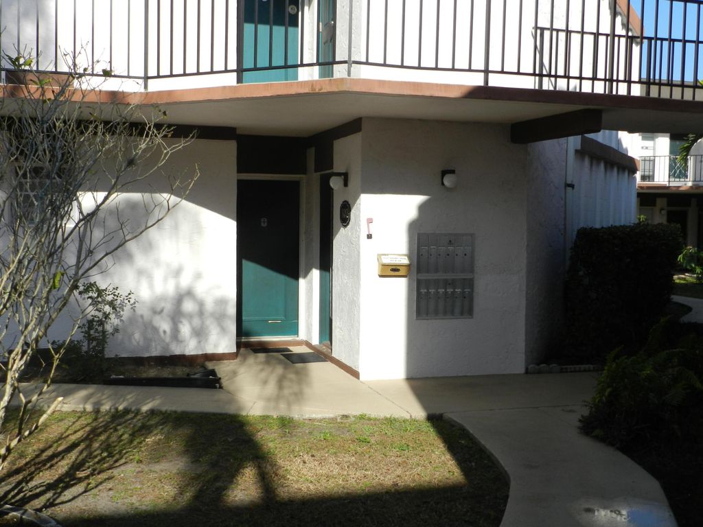 Photo of 4 Greenway Village N Vlg N #107, Royal Palm Beach, FL 33411 (MLS # R11165359)