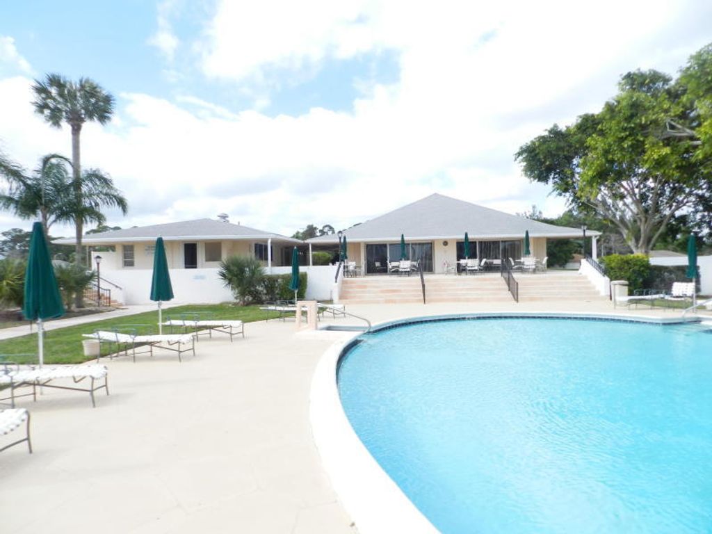 Photo of 4 Greenway Village N Vlg N #107, Royal Palm Beach, FL 33411 (MLS # R11165359)