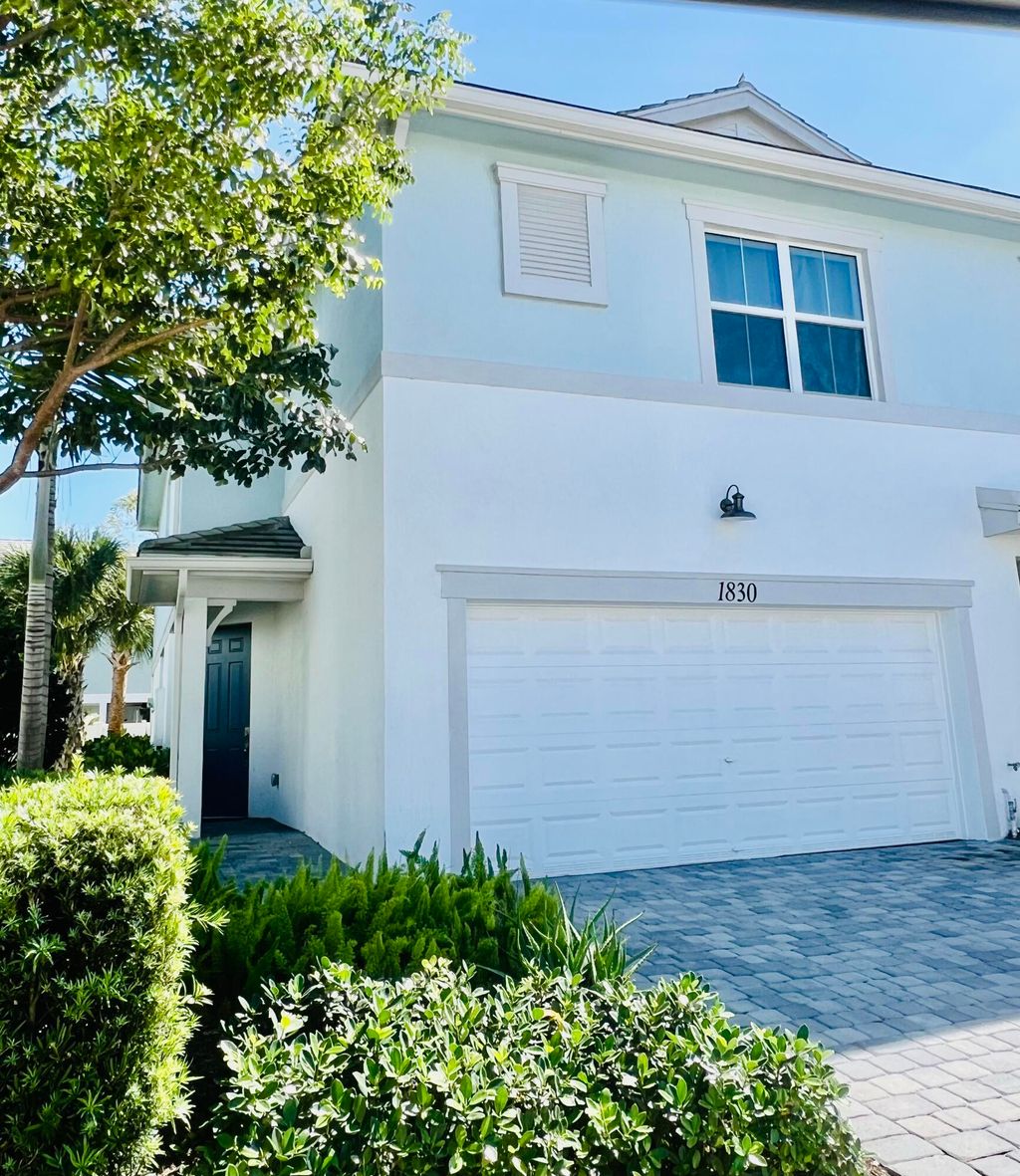 Photo of 1830 Sandpiper Pointe Place, Deerfield Beach, FL 33442 (MLS # B26011827)