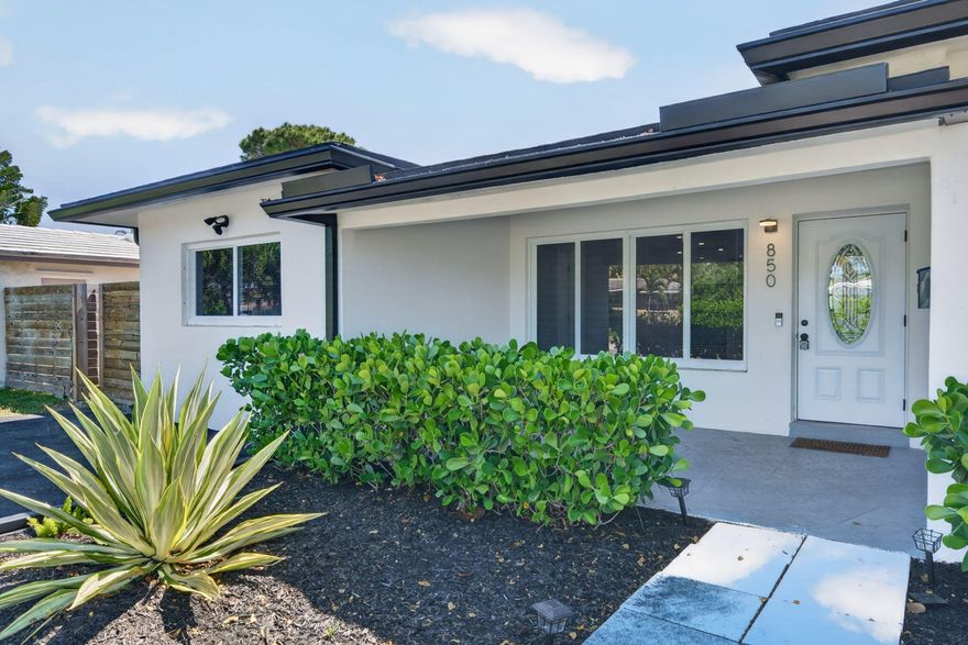 Stunning fully renovated ranch-style home — move-in ready with high-end finishes throughout. No HOA.  The open-concept layout features luxury vinyl plank flooring, recessed lighting, and a chef's kitchen with high-gloss European cabinetry, quartz countertops, marble-look backsplash, and stainless steel appliances.  The primary suite includes a custom walk-in closet and a spa-like en-suite with frameless glass shower and floor-to-ceiling Calacatta tile. The private, fully fenced backyard is an entertainer's dream — paver patio, fire pit lounge, and a standalone outdoor sauna. Wide paved driveway, tropical landscaping, and updated windows complete this exceptional rental.  Minutes to highways, shopping, dining, and beaches.