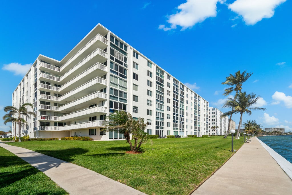 Photo of 301 Lake Shore Drive #702, Lake Park, FL 33403 (MLS # B26094688)