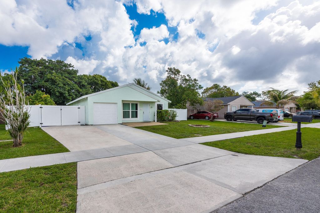 Photo of 10117 Mikado Lane, Royal Palm Beach, FL 33411 (MLS # B26031346)