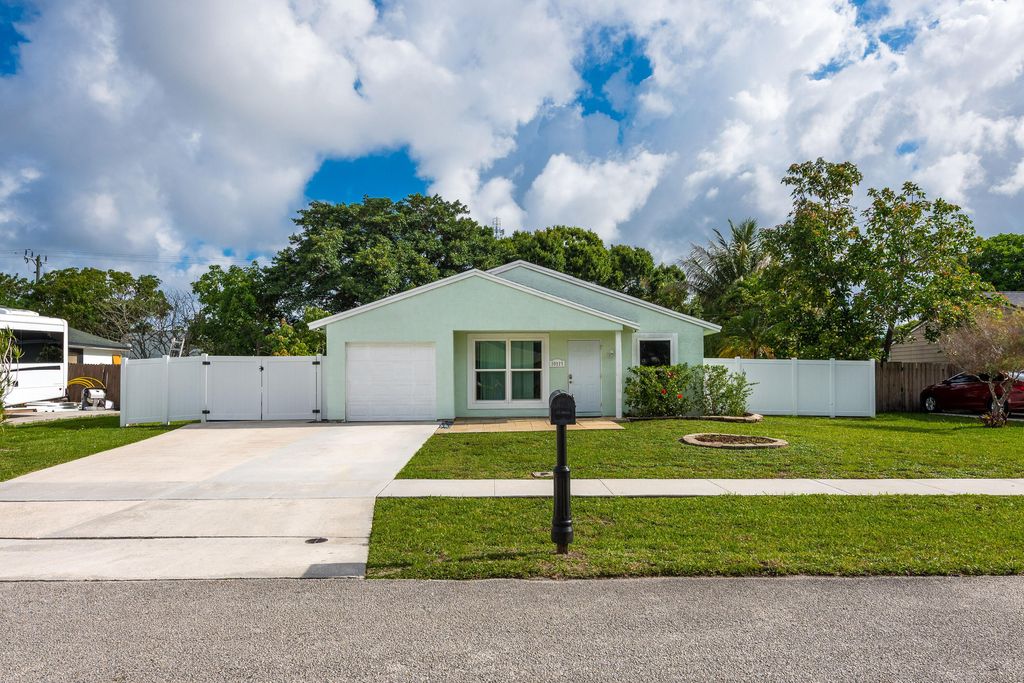 Photo of 10117 Mikado Lane, Royal Palm Beach, FL 33411 (MLS # B26031346)