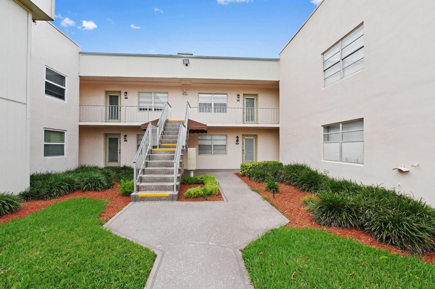 Handyman/Investor special with tons of potential featuring a serene lake view, located in the desirable Kings Point Golf & Country Club—an exclusive, 55+ community designed for comfortable and active living. Ideally situated just 6 miles from the ocean and vibrant, historic downtown Delray Beach. The kitchen opens to a comfortable living and dining area, creating a bright and functional layout perfect for everyday living or entertaining. Large windows and the corner location enhance the sense of space while capturing peaceful water views.  Additional highlights include an in-unit washer and dryer for added convenience. Located just 6 miles from the beach and the shops, dining, and culture of historic downtown Delray Beach, this home offers both relaxation and accessibility.  Enjoy all that Kings Point has to offer—golf, pools, clubhouse amenities, and an active lifestyle designed for its residents.