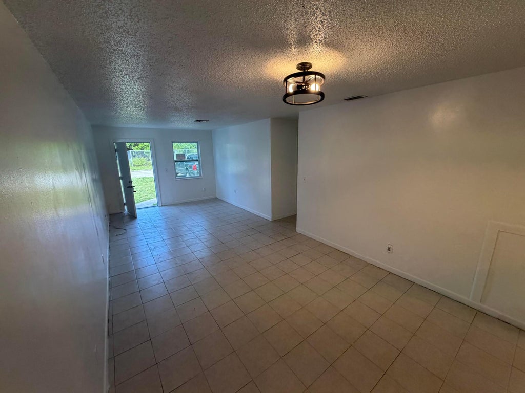 Photo of 5001 EASTWOOD Drive #A, Fort Pierce, FL 34951 (MLS # B26053512)