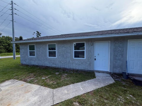 Photo of 5001 EASTWOOD Drive #A, Fort Pierce, FL 34951 (MLS # B26053512)