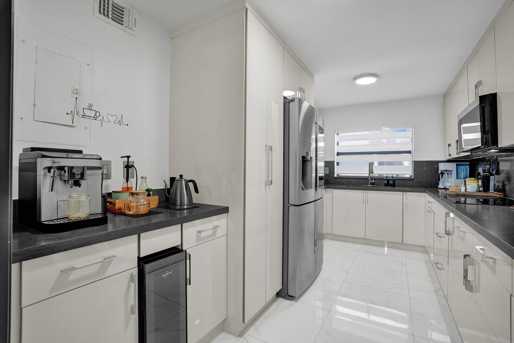 Photo of 8992 Palm Tree Lane #8992, Pembroke Pines, FL 33024 (MLS # B26015040)