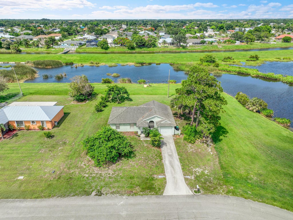 Photo of 2849 SW Pierson Road, Port Saint Lucie, FL 34953 (MLS # R11094851)