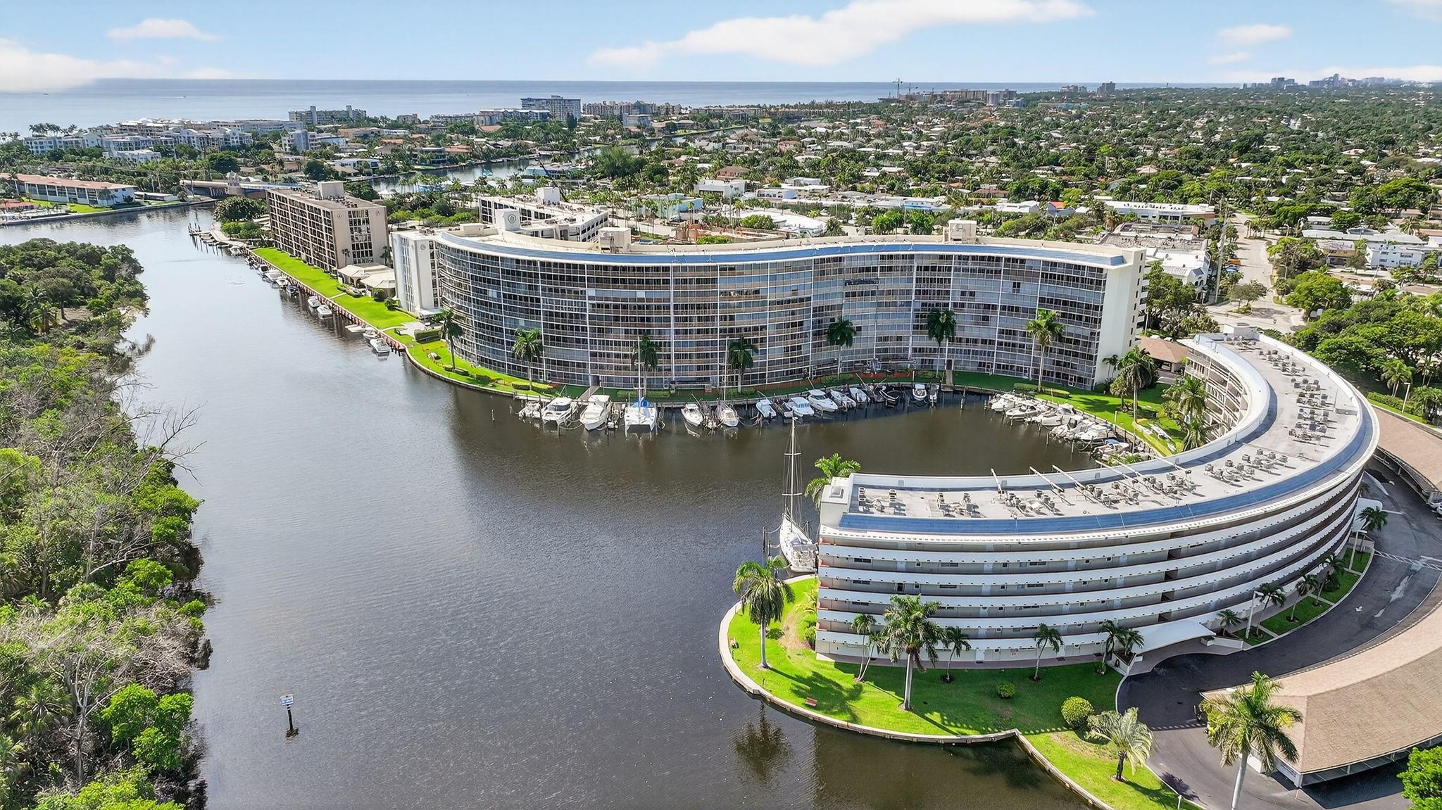 New balcony and concrete restoration are almost finished for this building! This is the perfect spot for watching the yachts sail by on the intracoastal in The Cove. This home is freshly painted and move in ready with remodeled kitchen and bathrooms. The primary bedroom has a large walk in closet with clothing racks installed. Immerse yourself in stunning waterfront & state park views from the moment you enter the front door! This property is just mins from Deerfield Beach, fine dining, & Mizner Park shopping & entertainment. New fiber optics are being installed, providing high-speed internet & broadcast. Take advantage of amenities like the kayak rack, jet ski floats, 60 ft pool, clubhouse, exercise room and sauna, game and party room, library, and marina with boat slips (when available).
