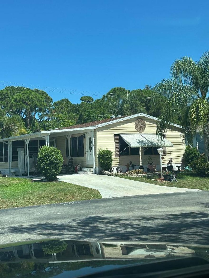 Spacious 2 bedroom 2 bath home.  Split bedrooms, two different living areas, inside laundry, screened porch, shed all backing to trees for added privacy.  Buyer responsible to verify all information.