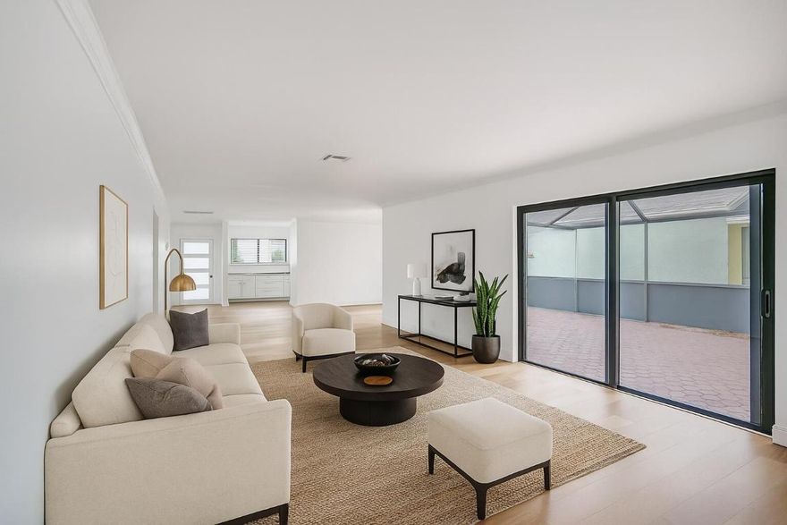 TOTAL RENOVATION with IMPACT GLASS. Everything is NEW inside this home in the heart of Delray Beach. Rainberry Bay is a gated Active Adult community only 3 miles from Atlantic Avenue and the #1 Beach in Florida!
Primary bedroom with 2 customized walk-in closets. All new baths with frameless glass enclosure, new cabinets and plumbing fixtures. All new kitchen, cabinets, stonework, stainless steel appliances. New A/C, water heater, lighting fixtures and beautiful wood floors complete this renovation. With an oversized 2 car garage and a huge screened patio it is perfect for enjoying the outdoors. Walk to the main clubhouse and enjoy the amenities there or venture to one of the others. There are pools, spas, pickleball, tennis, an events theatre and many other activities.