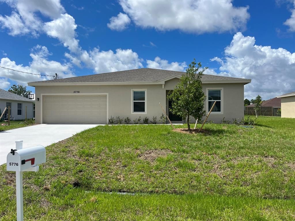 Photo of 5776 NW Erin Avenue, Port Saint Lucie, FL 34953 (MLS # R10805147)