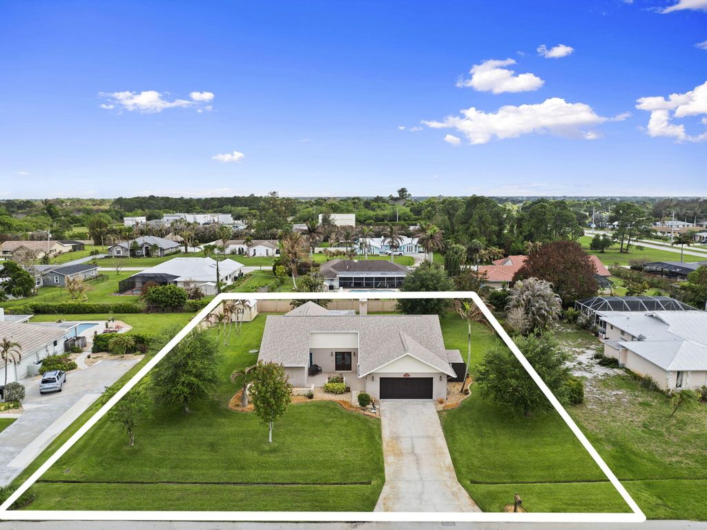 Photo of 1730 SE Canora Road, Port Saint Lucie, FL 34952 (MLS # B26018976)
