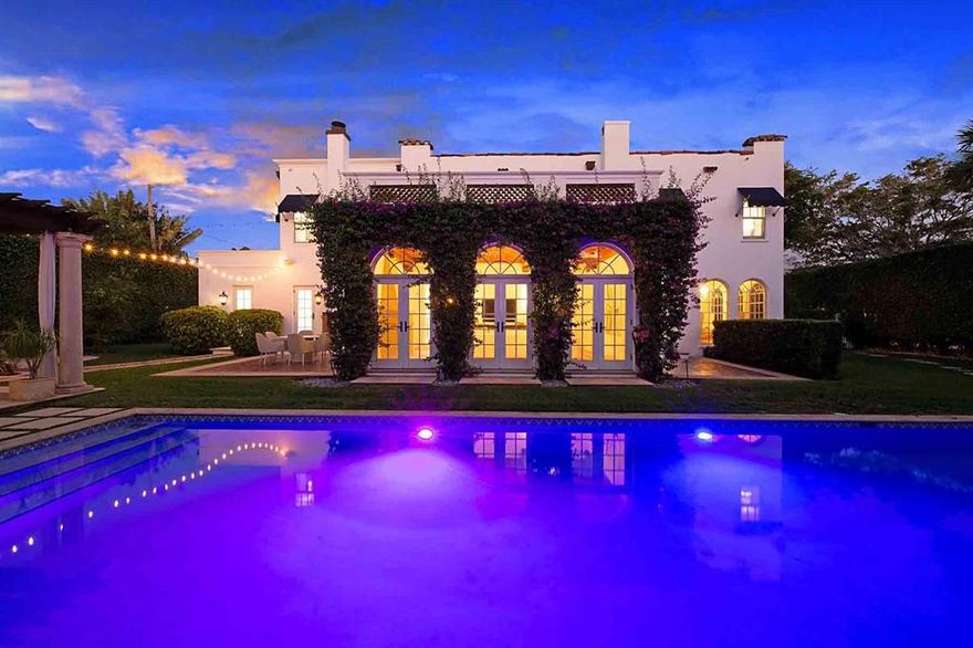 Welcome to this newly renovated glamorous Southern California interior meets Mediterranean mission Old Northwood home. A 1925 Architectural Masterpiece built by J.A. Bowery. Mission Style 2 - Story Home.Renovated by a distinguished interior designer. Fresh, soothing white-blonde tones are throughout the 4-bedroom all ensuite - 5.5 bathroom house. Stunning additions include a Christopher Peacock epicurean kitchen, luxurious Waterworks bath fixtures, white brushed walls, custom wood impact windows and doors, and Paris Ceramics antique tile in the family room and bar area. The spacious family room includes a gas-stone fireplace and hand-wood-crafted inlaid ceiling. The family room, with a bank of French doors, as well as all doors, leads to a dramatic backyard of contemporary,