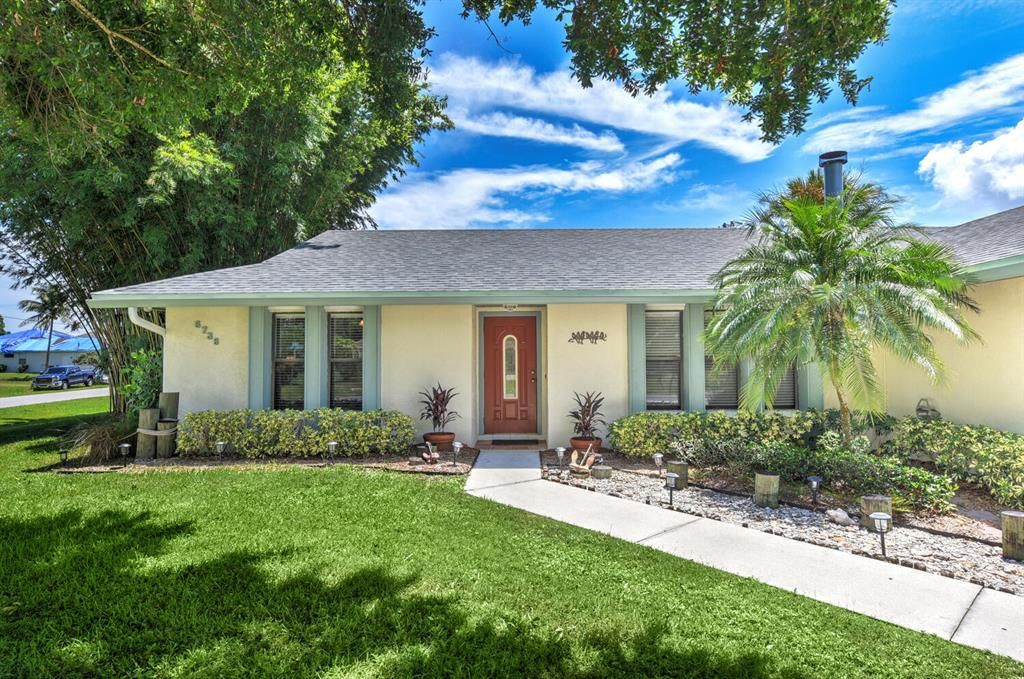 Photo of 6738 NW Daffodil Lane Ln, Port St Lucie, FL 34983 (MLS # R10827928)