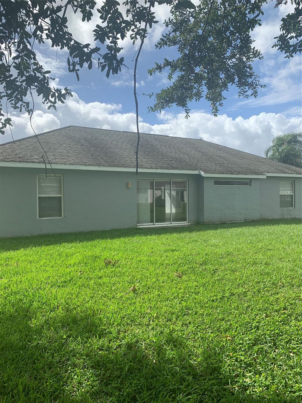 Photo of 1481 SW Leisure Lane, Port Saint Lucie, FL 34953 (MLS # F10472646)