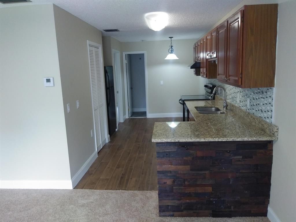 Photo of 2050 Oleander Boulevard #8-207, Fort Pierce, FL 34950 (MLS # R10755919)