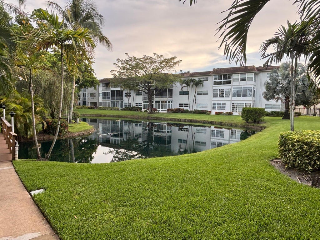 Photo of 5171 W OAKLAND PARK Boulevard #308, Lauderdale Lakes, FL 33313 (MLS # B26077698)