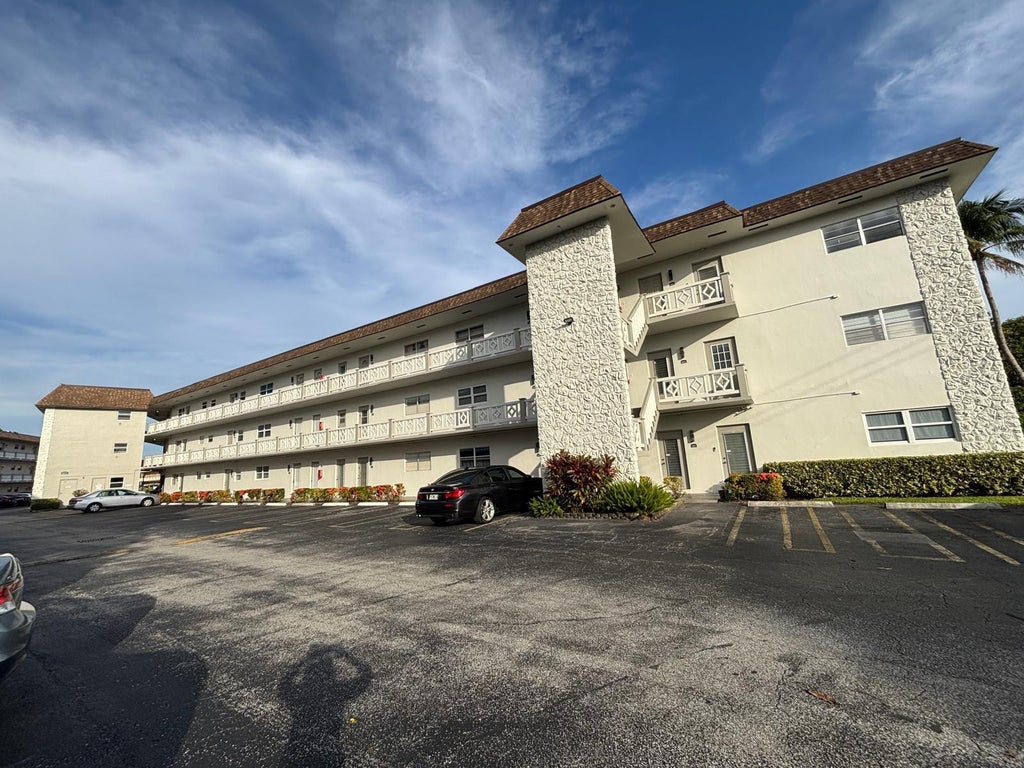 Photo of 5171 W OAKLAND PARK Boulevard #308, Lauderdale Lakes, FL 33313 (MLS # B26077698)