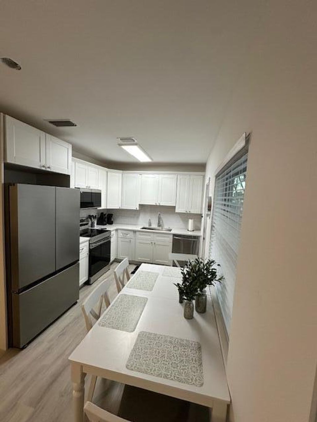 Photo of 522 Eastwind Drive, North Palm Beach, FL 33408 (MLS # R11149736)