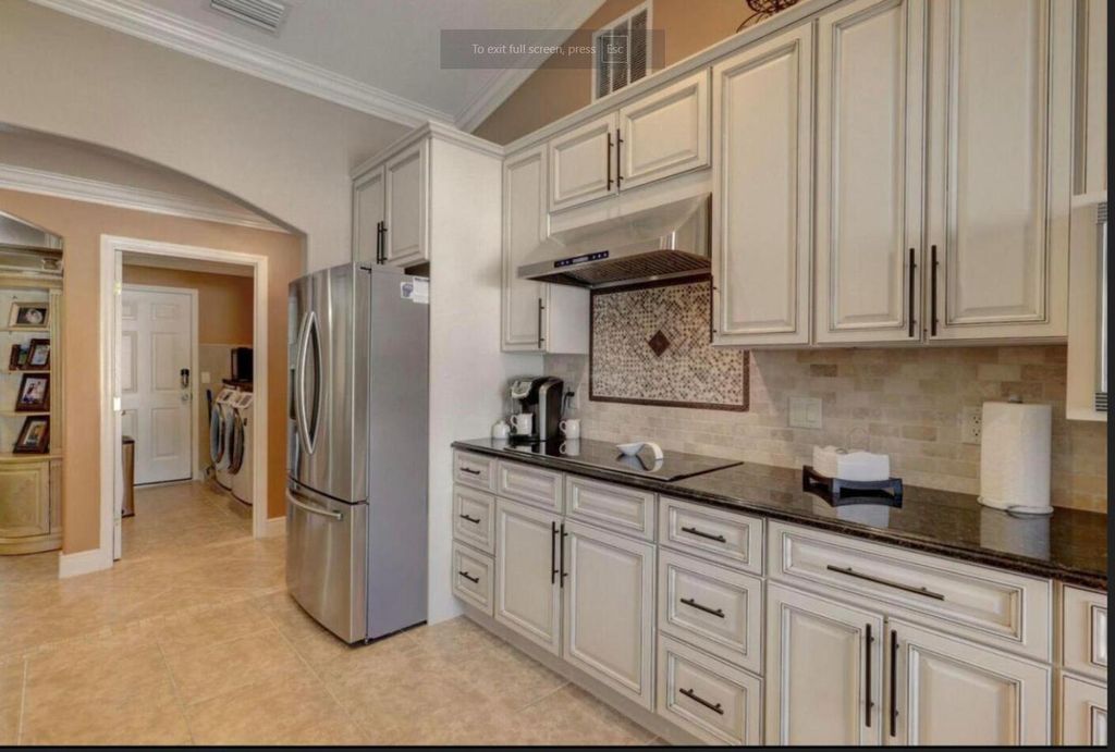 Photo of 2529 SW Grotto Circle, Port Saint Lucie, FL 34953 (MLS # R11077772)