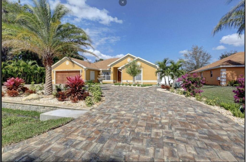 Photo of 2529 SW Grotto Circle, Port Saint Lucie, FL 34953 (MLS # R11077772)