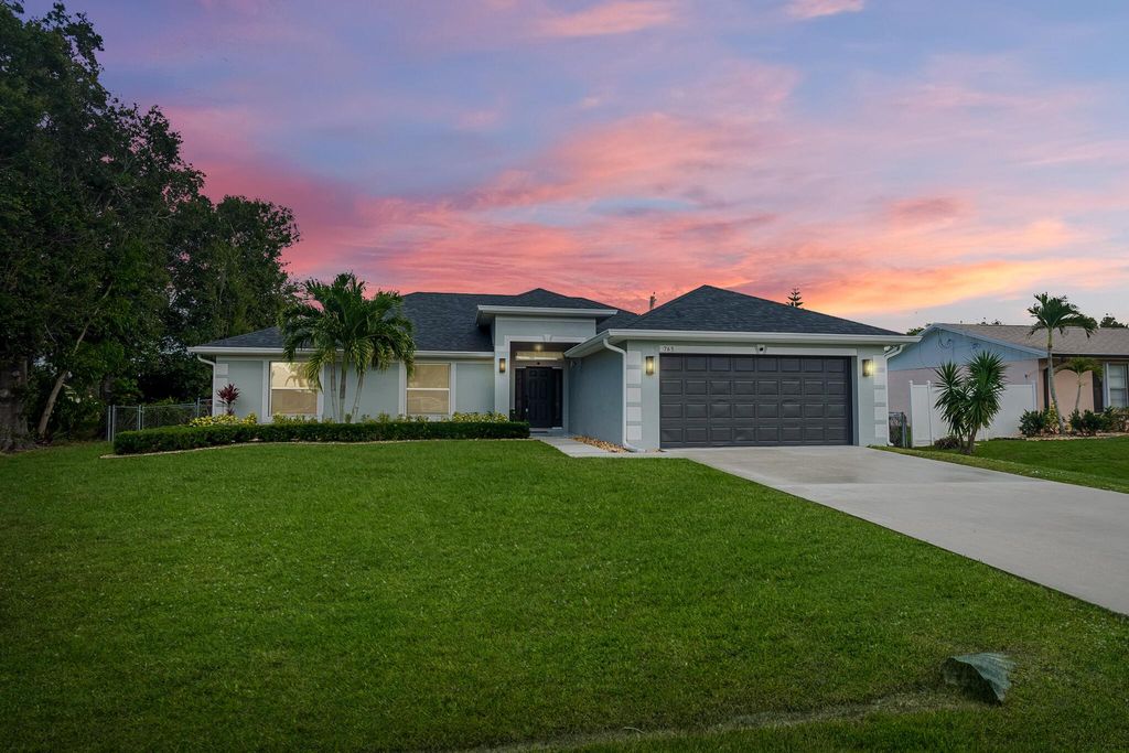 Photo of 765 SW Hibiscus Street, Port Saint Lucie, FL 34983 (MLS # R11138516)