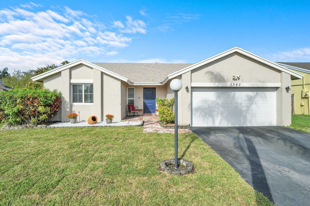 Photo of 1393 SW 151st Way, Sunrise, FL 33326 (MLS # B26000587)