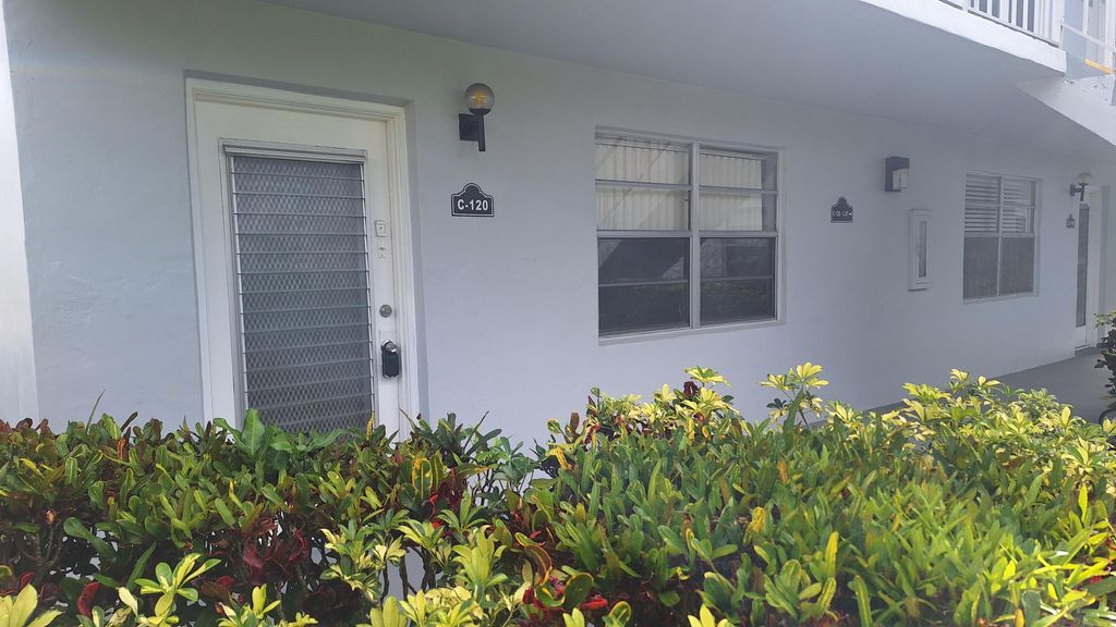 Photo of 120 Normandy Ln #C, Delray Beach, FL 33484 (MLS # B26013580)