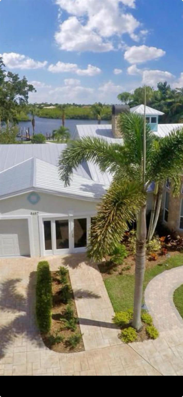 Beautifully newly renovated waterfront home with private dock lift and boat available. Fisherman and boaters paradise private dock lift and boat available. Catch Snook tarpon and snapper . Spectacular wide water views of Johnathin Dickison state park . Only wide water views of nature no other homes . Extremely private spot . No HOA no rules other then living your best life . Metal roof hurricane vaulted ceilings . Great new seawall . Very large split floor plan with huge master and huge closets . On a very private half Acer lot . It does not get much better .
