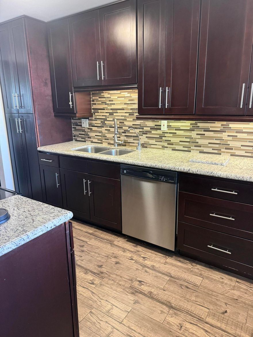 Welcome home to this corner ground level unit that when you open the front door you say wow to this remodeled kitchen featuring stainless steel appliances beautiful tiled pull out pantry. Unit has its own washer and dryer combo. Unit has 1 bedroom 1.5 bathrooms. Ac was just replaced a couple years ago so no big ticket items for you. Nice screened in patio off the master bedroom. this is the one. Community amenities includes clubhouse, pool , and cable and tv service and exterior building maintenance. this one won't last come see