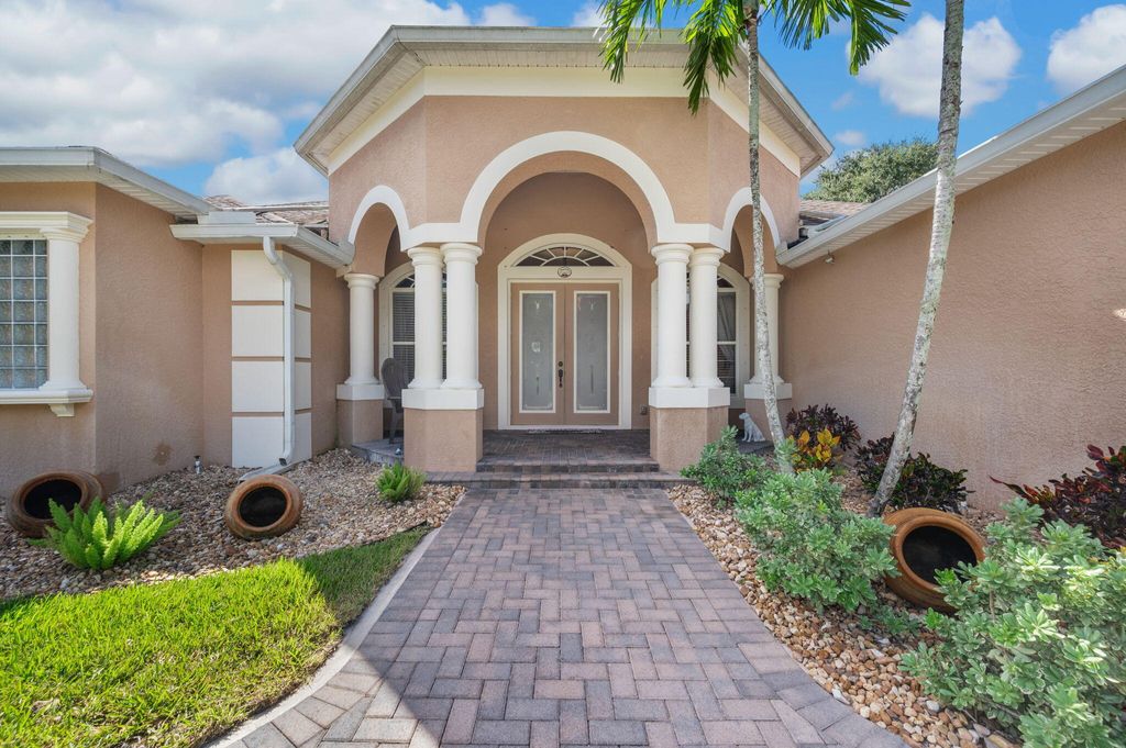 Photo of 1438 SW Apache Avenue, Port Saint Lucie, FL 34953 (MLS # R11132544)