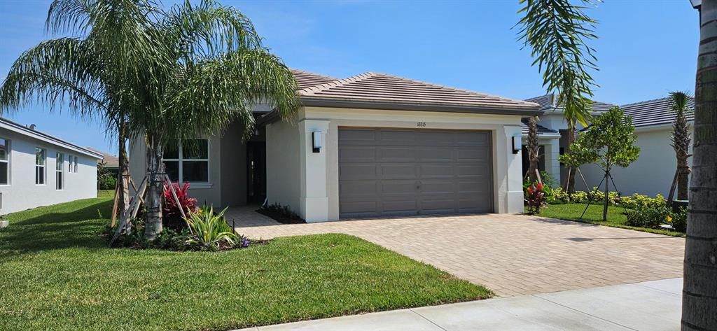 Photo of 13315 SW River Rock Road, Port St Lucie, FL 34987 (MLS # R10888421)