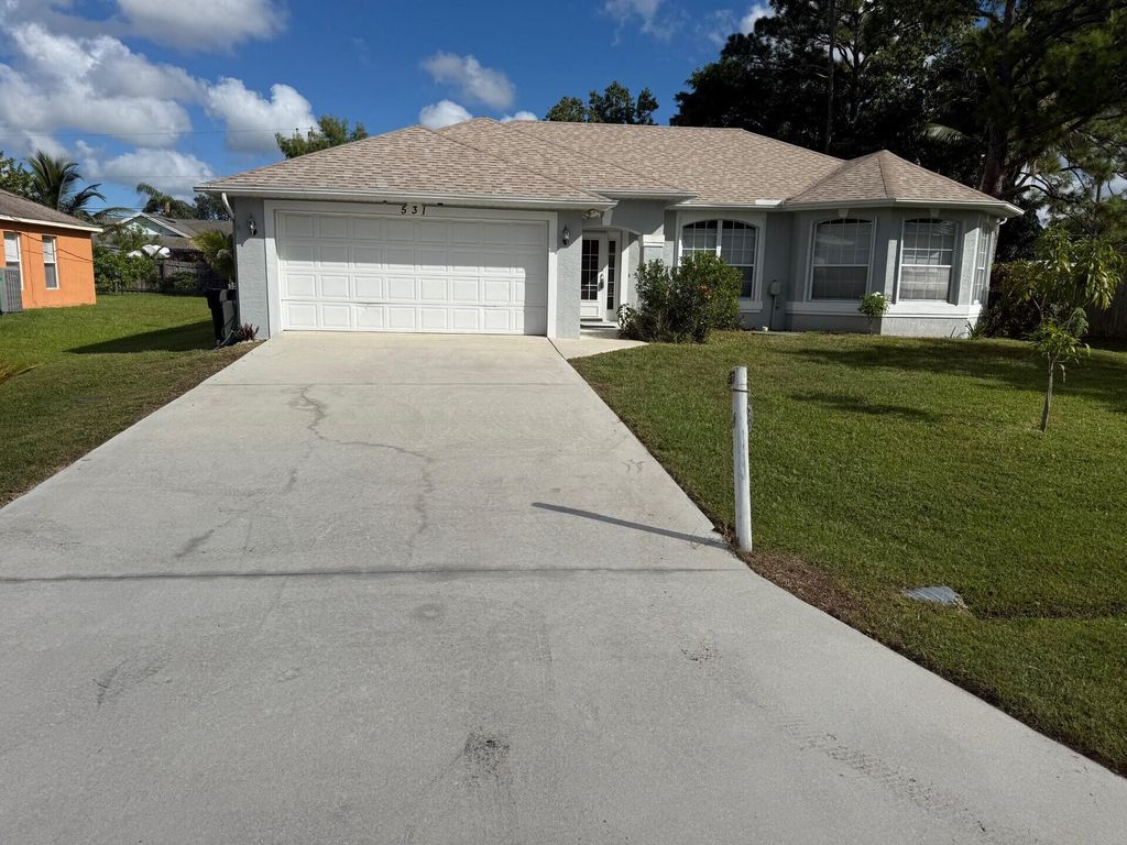 Photo of 531 SE Evergreen Terrace, Port Saint Lucie, FL 34983 (MLS # R11092029)