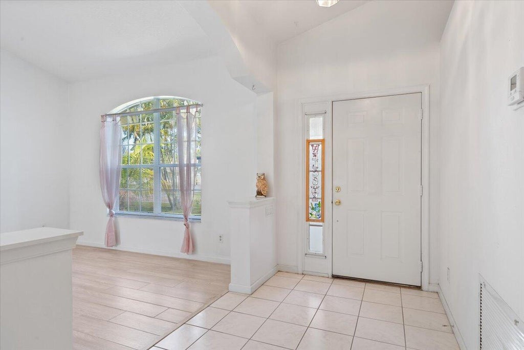 Photo of 531 SE Evergreen Terrace, Port Saint Lucie, FL 34983 (MLS # R11092029)