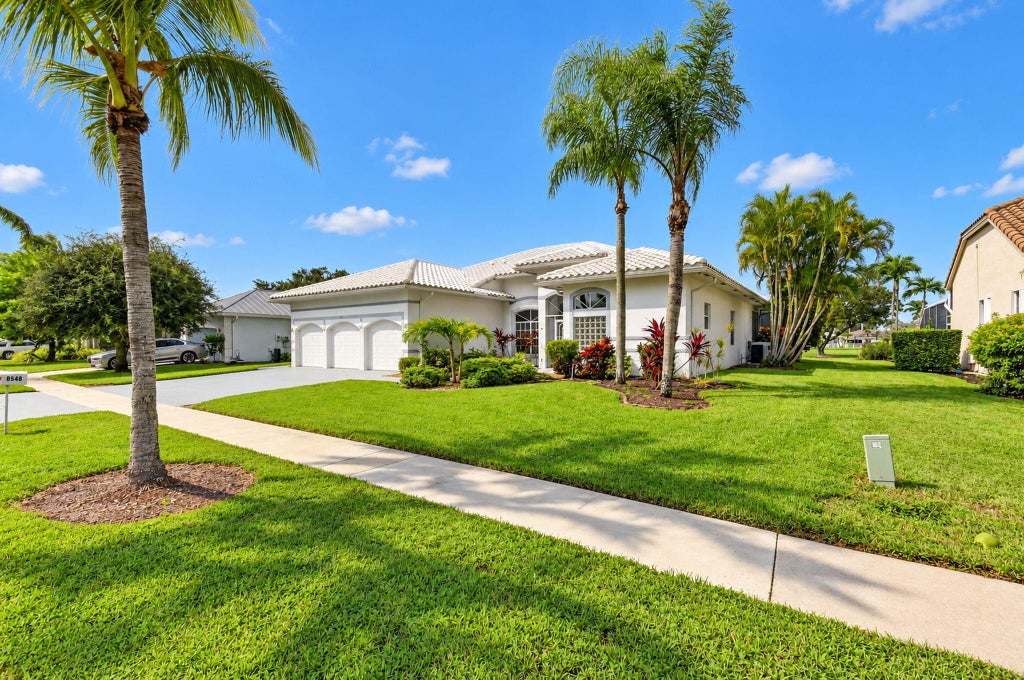 Photo of 6548 ROCK CREEK Drive, Lake Worth, FL 33467 (MLS # B26089219)